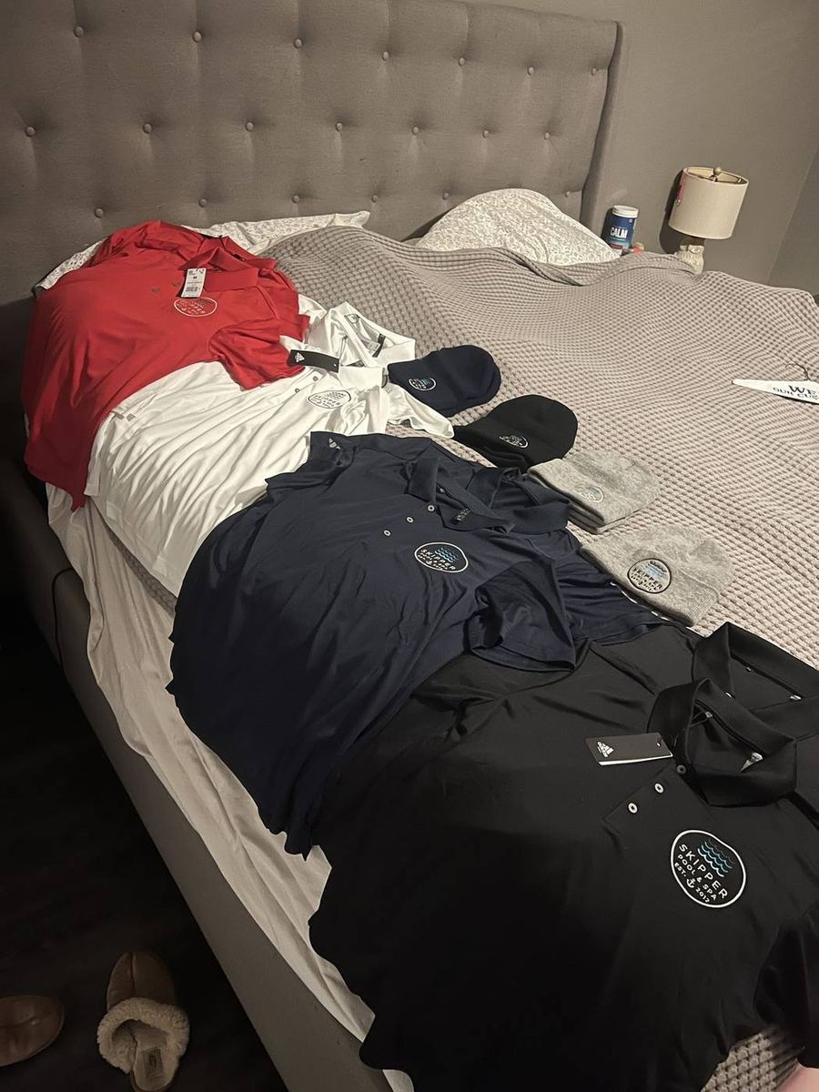 Skipper Pool & Spa branded polos and beanies