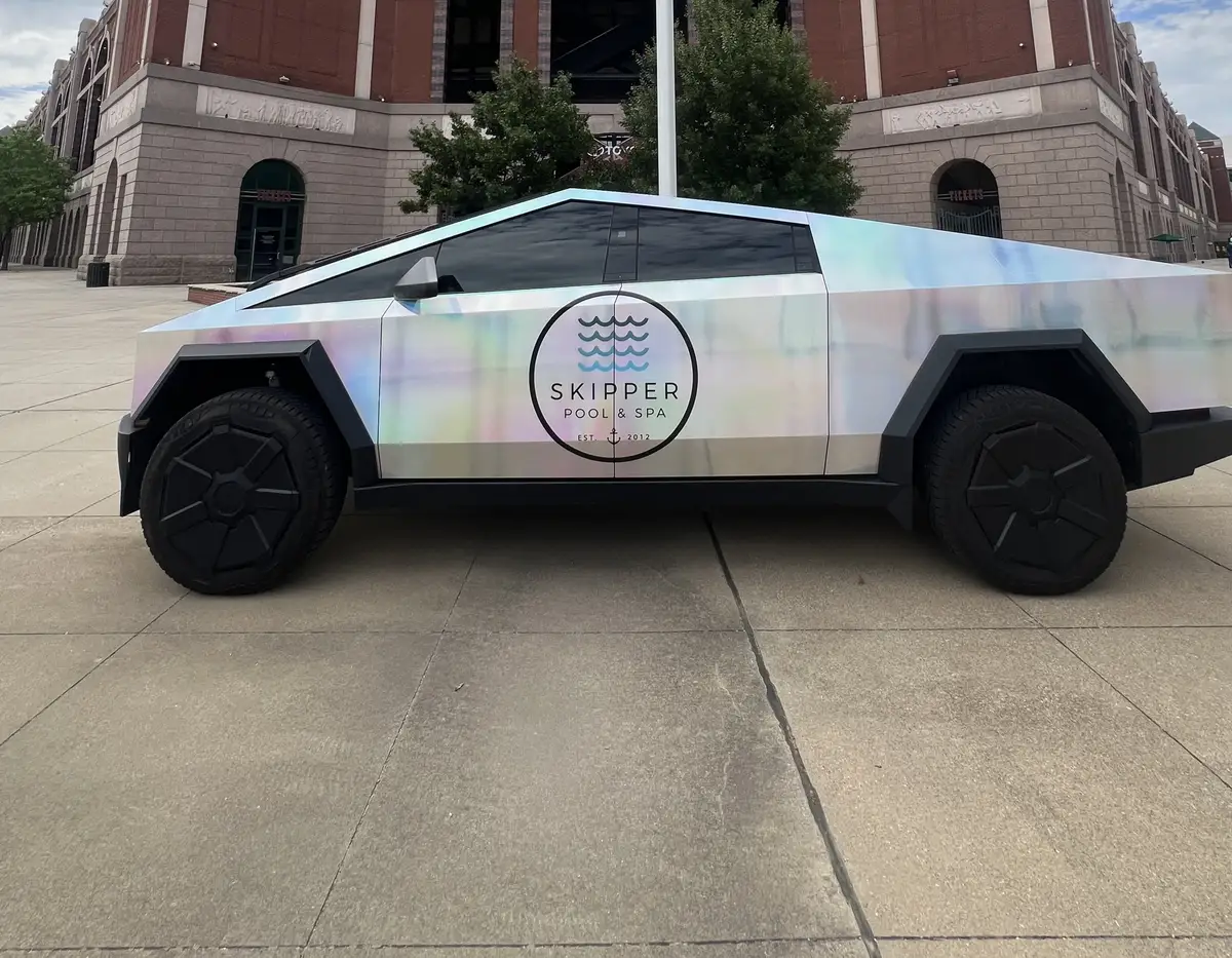 Skipper Cybertruck parked outside a ballpark