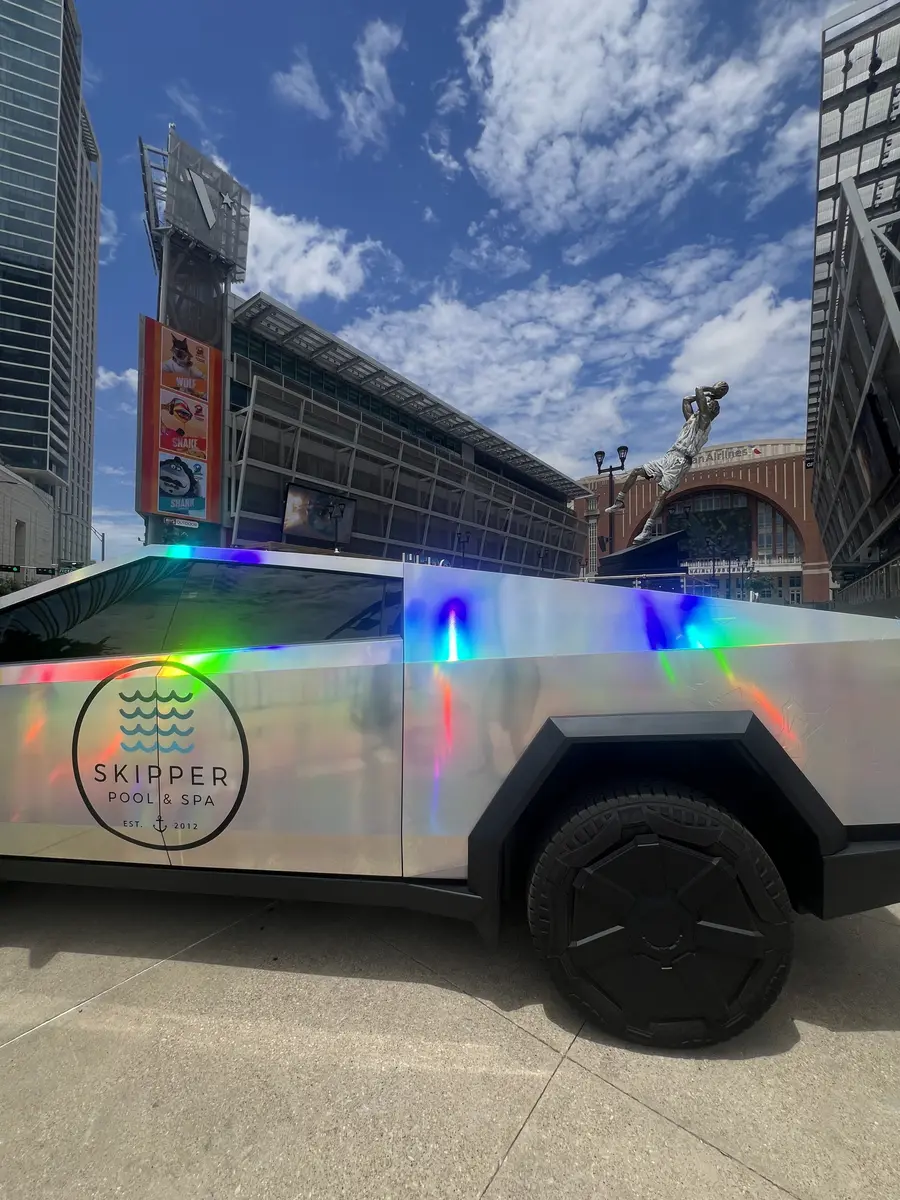 Skipper Cybertruck parked on a downtown plaza