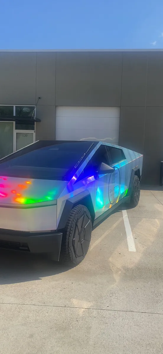 Holographic Cybertruck parked outside a shop
