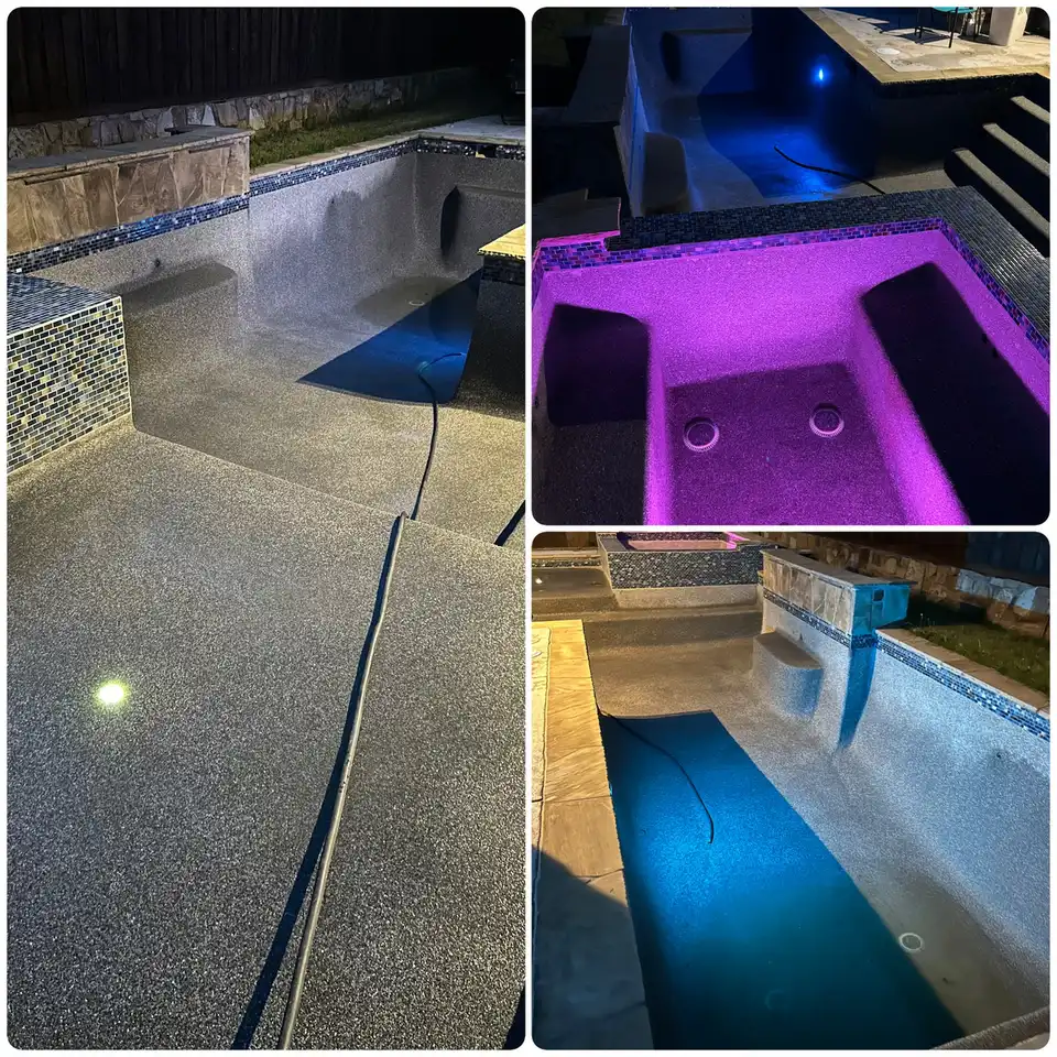 Empty pool and spa with night lights during a refinish