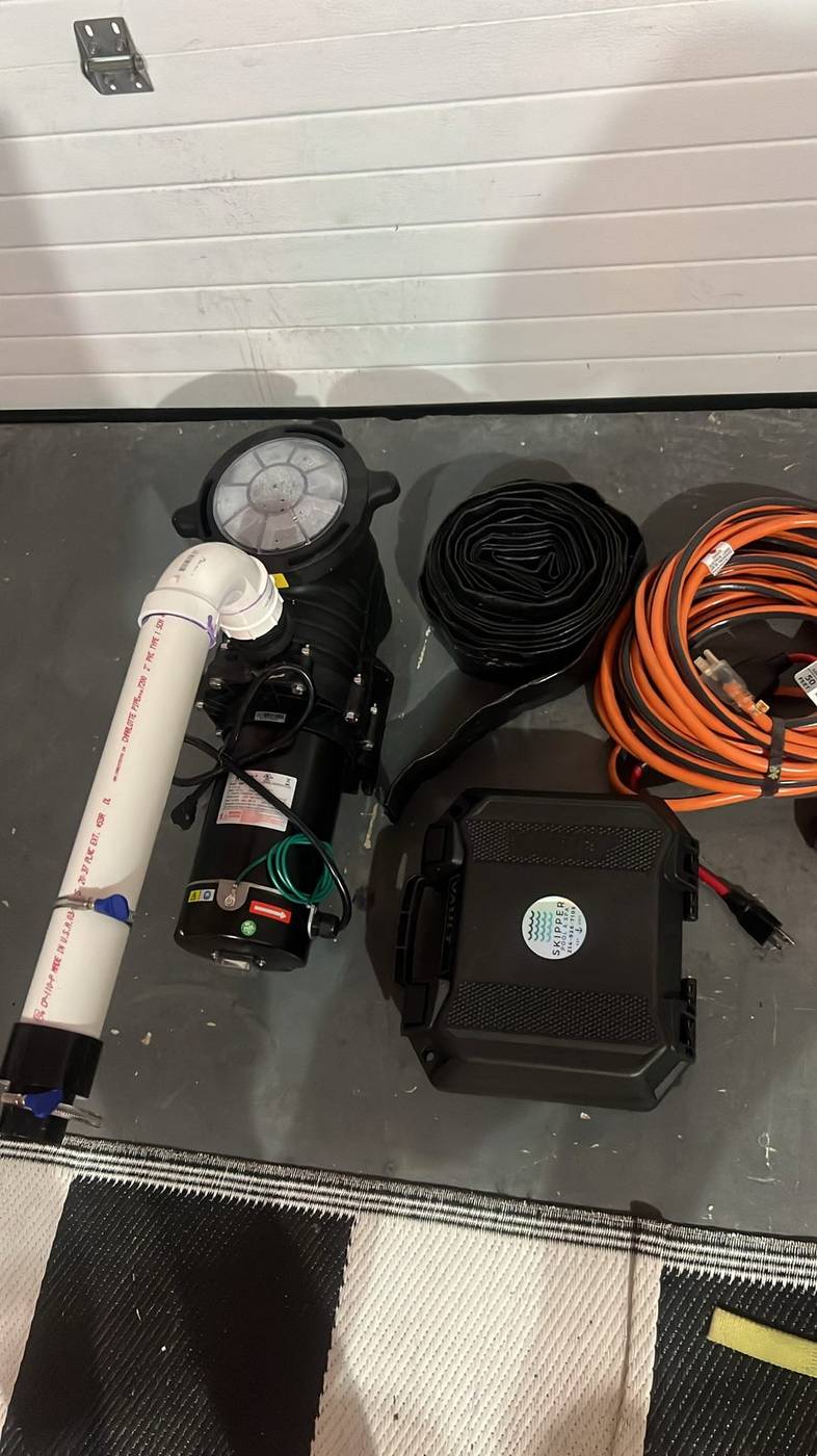 Variable-speed pool pump, Skipper hard case, and service hoses