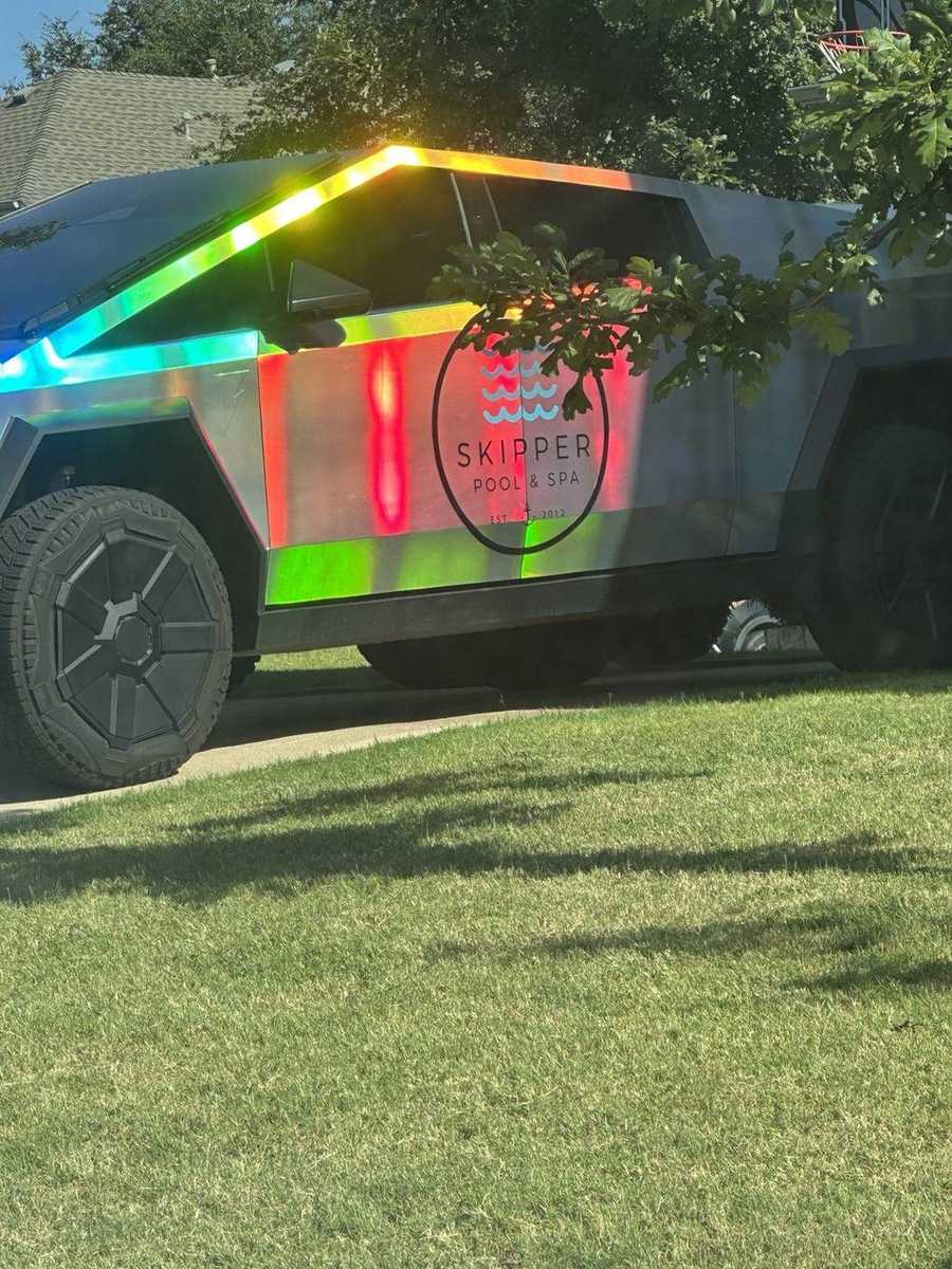 Skipper Pool & Spa logo wrap on Cybertruck door