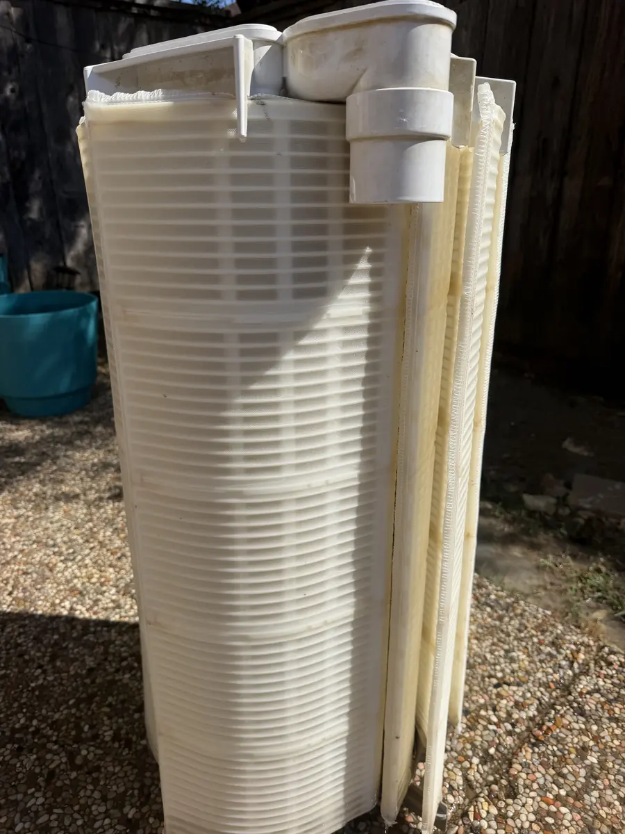 DE filter grid assembly pulled for service