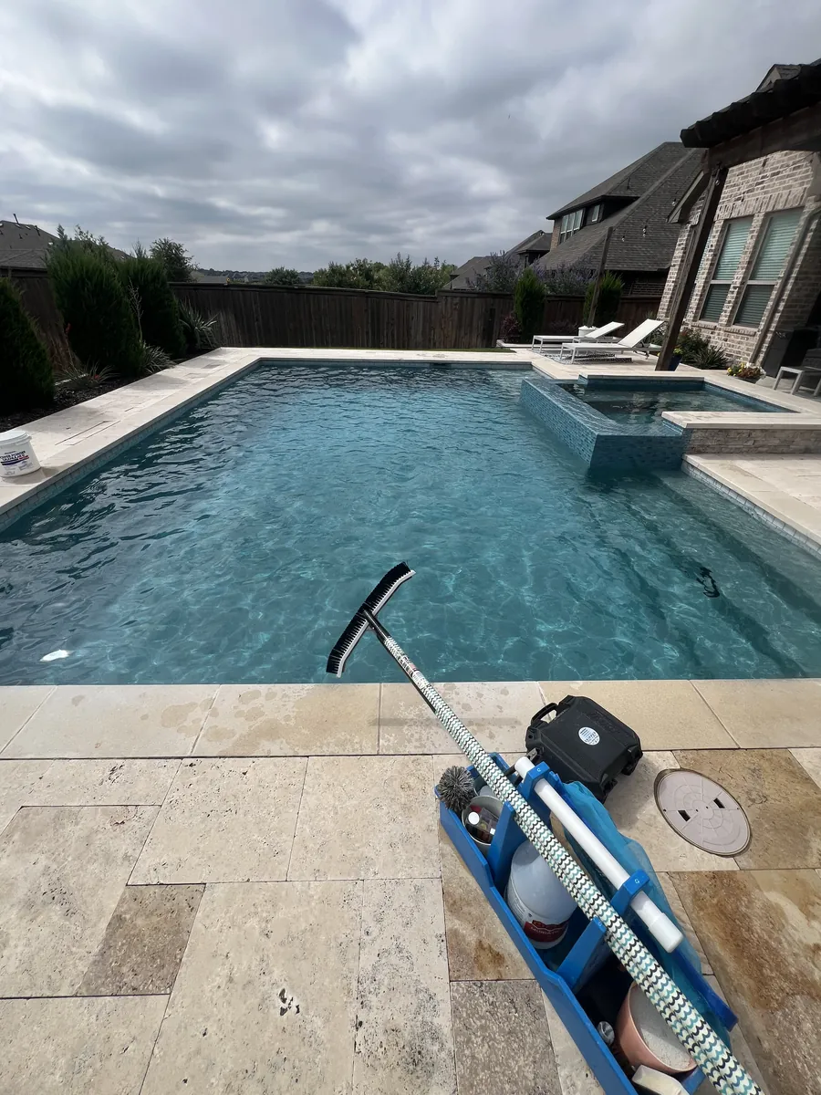 Rectangle pool and spa with the Skipper caddy on the deck