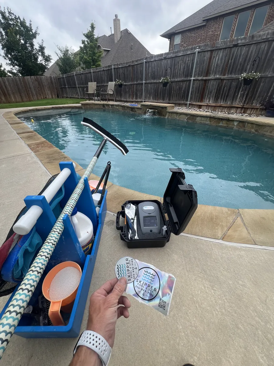 Reading a test strip against the chart beside the service caddy